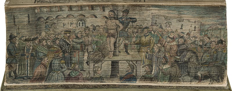 Coloured, hand-drawn illustation on the fore-edge of an old book. In the centre, a male figure is being tied to a stake. A crowd surrounds him. In the background there is an old, stone building.