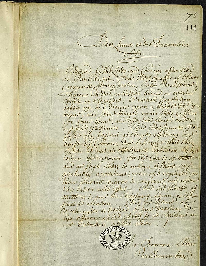 Old discoloured document filled with elegant handwriting in ink.